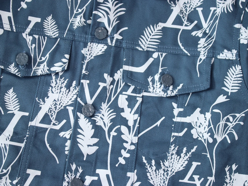 Close-up detail shot of Louis Vuitton luxury clothing with signature branding