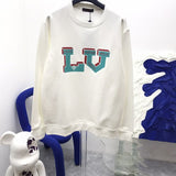 Side profile of Louis Vuitton luxury clothing with runway-inspired design