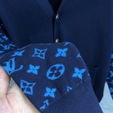 Back view of Louis Vuitton luxury clothing with signature branding