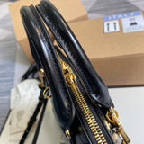 Handle and strap detail of classic refined women's handbag – women's luxury handbag
