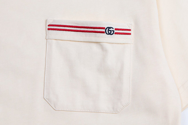 Front view of Gucci luxury clothing with signature branding