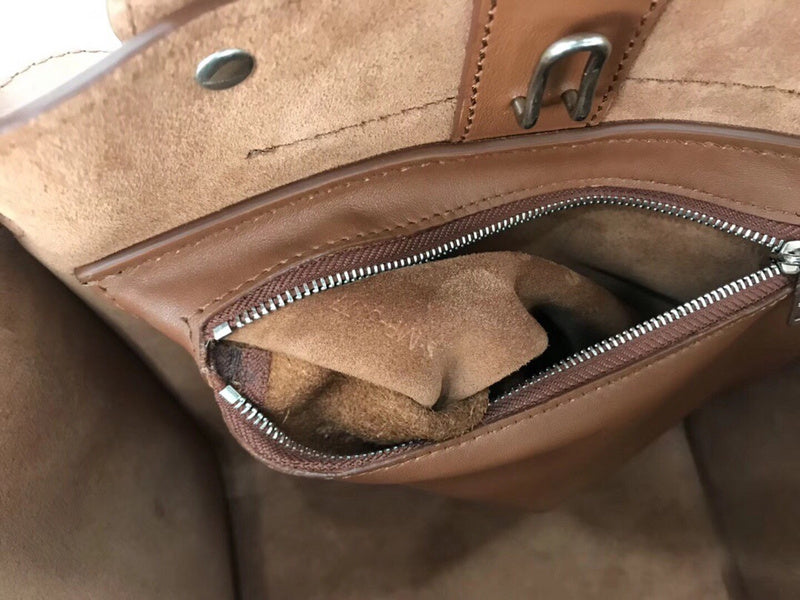 Front view of modern signature women's handbag – women's designer-style accessory