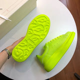 Alexander McQueen two-tone luxury sneakers view 5 signature lace-up style