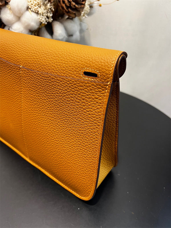  Clean-Lined top-handle bag carried on shoulder 10