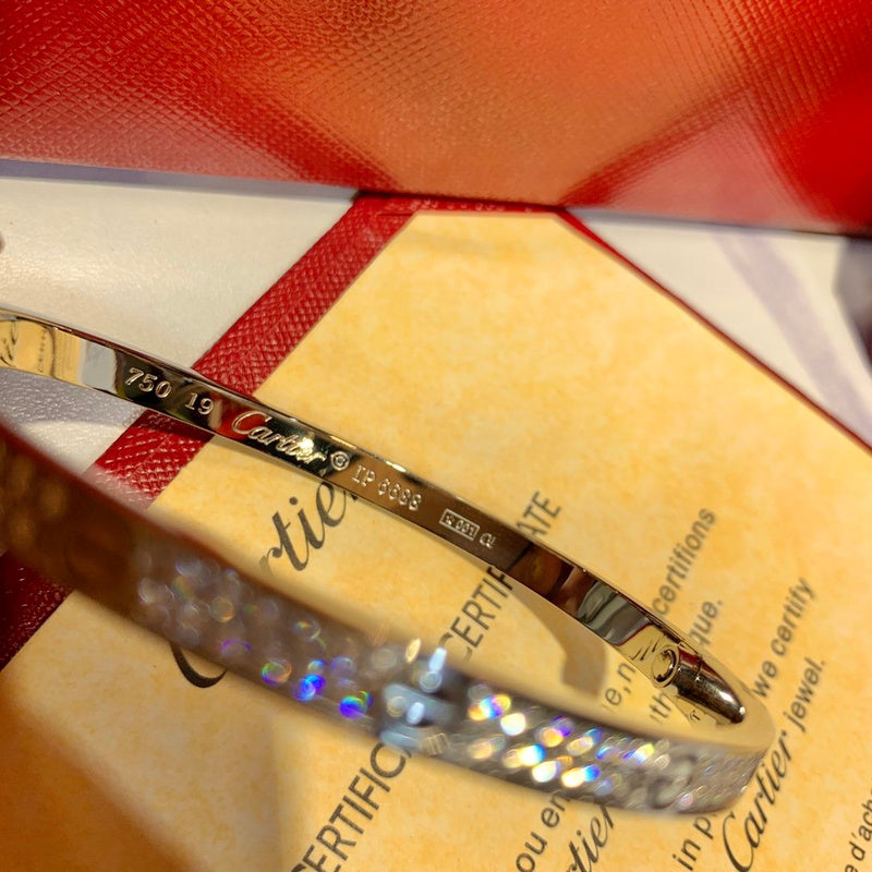 Close-up detail view of Cartier unisex jewelry piece