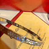 Close-up detail view of Cartier unisex jewelry piece