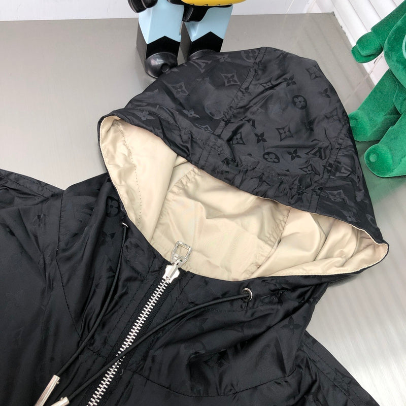 Close-up detail shot of Louis Vuitton luxury clothing with signature branding