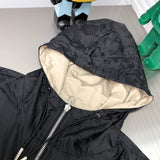 Close-up detail shot of Louis Vuitton luxury clothing with signature branding