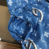 Close-up detail shot of Louis Vuitton cotton t-shirt with label-forward styling