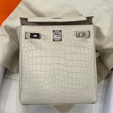 Side view of minimalist structured handbag