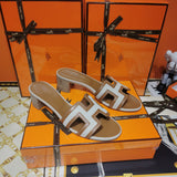 Hermès White Slide Sandals - Detail Shot of Craftsmanship