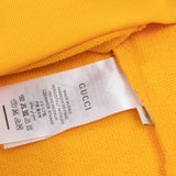 Close-up detail shot of Gucci luxury clothing with tailored silhouette