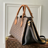  clean-lined top-handle bag detail view showing craftsmanship 8