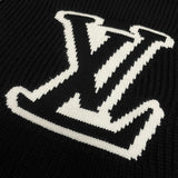 Full styled look of Louis Vuitton luxury clothing with monogram-inspired silhouette