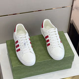 Gucci two-tone luxury sneakers view 11 signature lace-up style