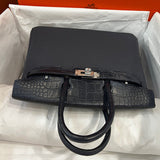 Side view of statement structured handbag