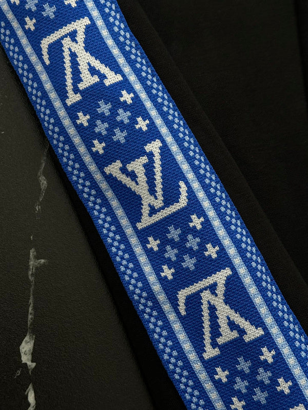 Close-up detail shot of Louis Vuitton luxury clothing with streetwear-inspired cut