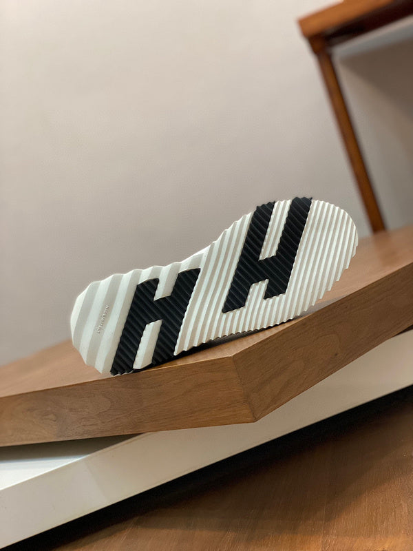 Hermes sandals Style 100 - logo and branding close-up