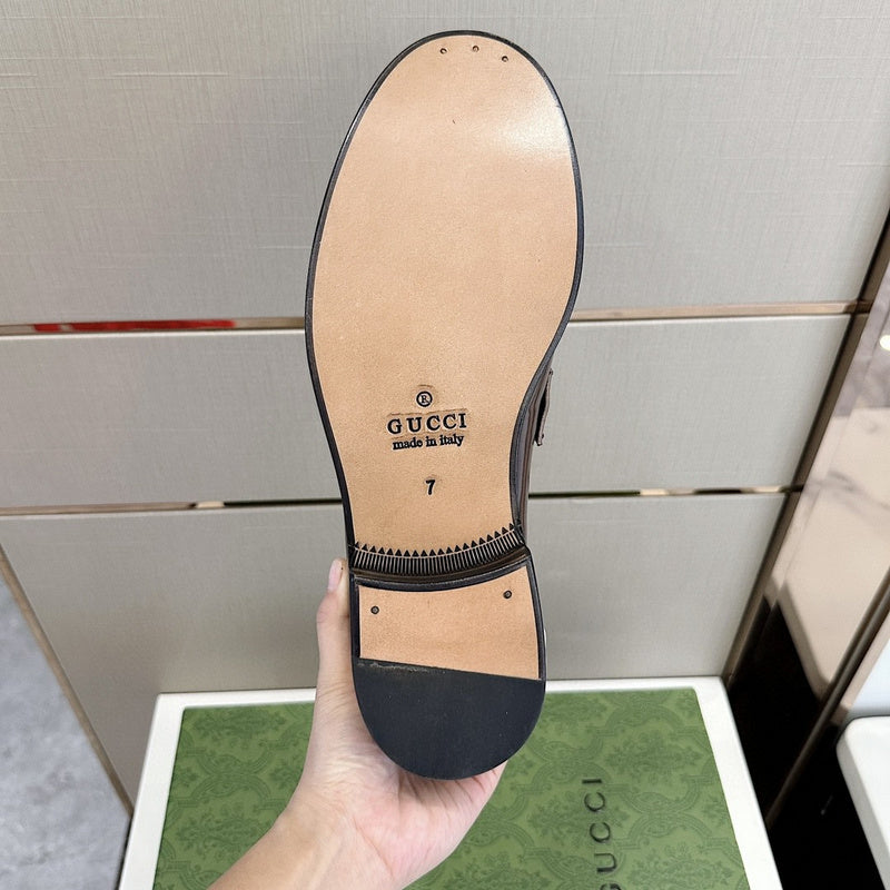 Side profile of Gucci classic monochrome sneakers heritage-inspired look