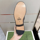 Side profile of Gucci classic monochrome sneakers heritage-inspired look
