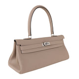  tailored top-handle bag styled with outfit