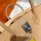Side view of clean-lined structured handbag