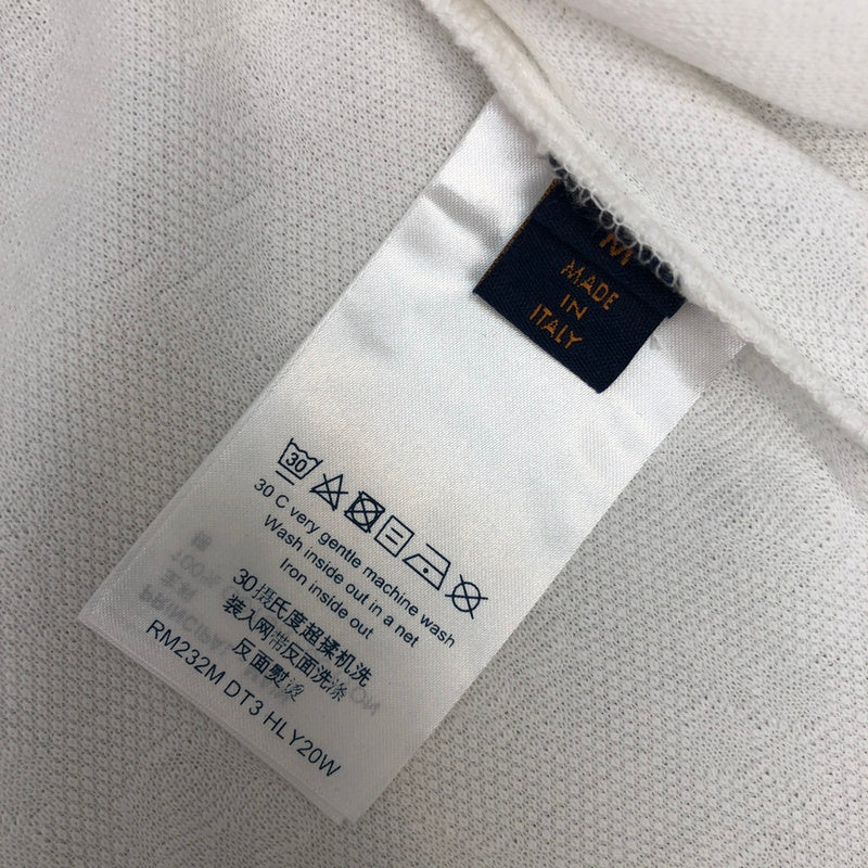 Flat lay presentation of Louis Vuitton cotton t-shirt with label-forward styling