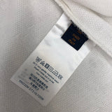 Flat lay presentation of Louis Vuitton cotton t-shirt with label-forward styling
