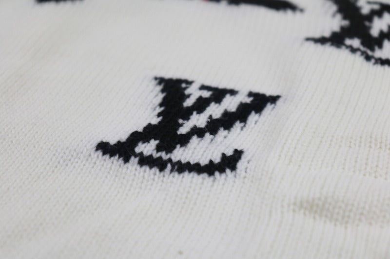 Full styled look of Louis Vuitton luxury clothing with logo-detail design