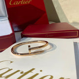 Side view of Cartier unisex jewelry piece