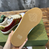 Side profile of Gucci bold contrast sneakers signature lace-up style