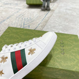 Side profile of Gucci clean off-white sneakers bold athletic profile