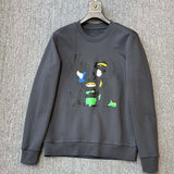 Front view of Louis Vuitton luxury clothing with tailored silhouette