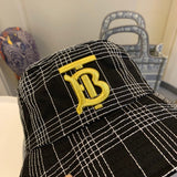 Side view of Burberry unisex cap
