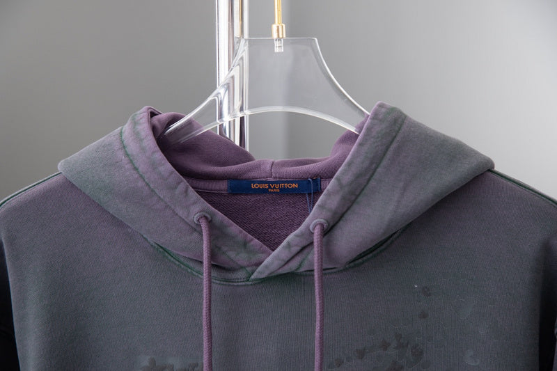 Close-up detail shot of Louis Vuitton luxury clothing with tailored silhouette