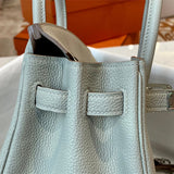 Side view of versatile structured handbag