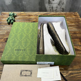 Gucci classic monochrome luxury sneakers view 9 heritage-inspired look