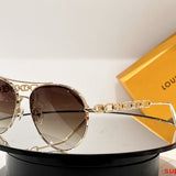 Close-up detail view of Louis Vuitton unisex sunglasses