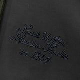 Full styled look of Louis Vuitton luxury clothing with signature branding