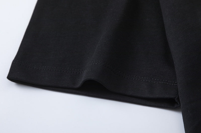 Flat lay presentation of Givenchy luxury clothing with signature branding
