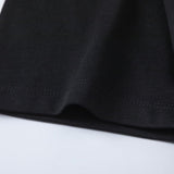 Flat lay presentation of Givenchy luxury clothing with signature branding