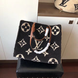 Handle and strap detail of classic sleek women's handbag – women's everyday handbag