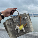 Side view of statement structured handbag
