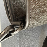 Back view of elevated premium women's handbag – women's statement bag