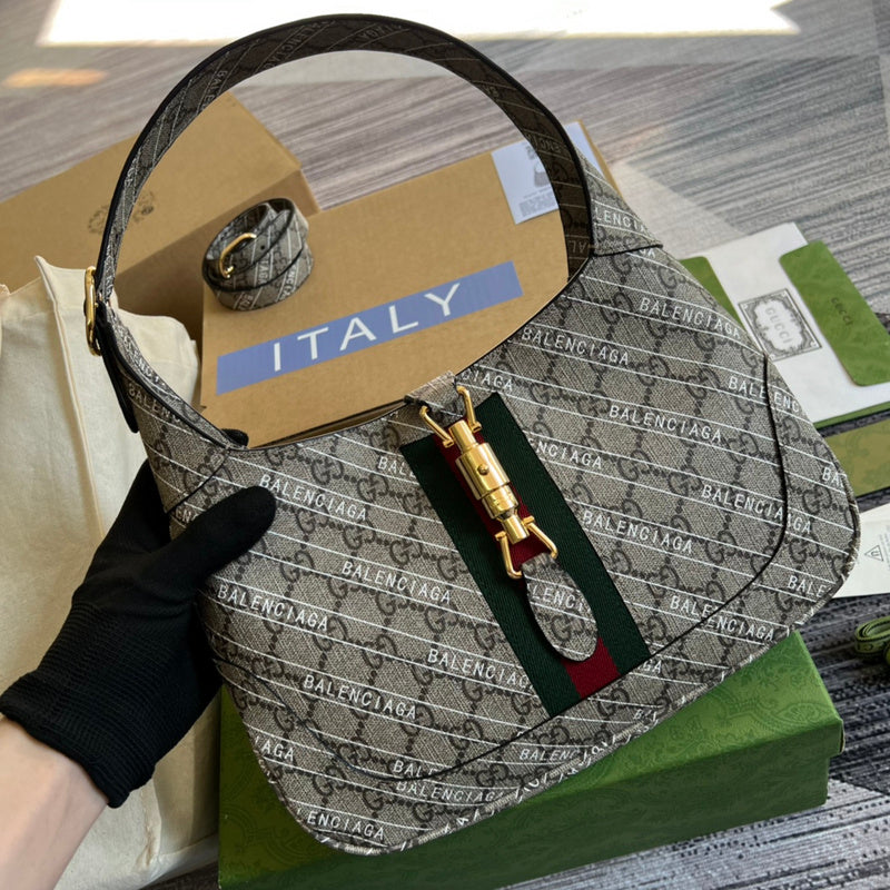 Front view of structured classic women's handbag – women's designer-style accessory