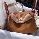 Fluid bag women's premium everyday handbag