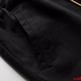 Front view of Rhude luxury clothing with everyday silhouette