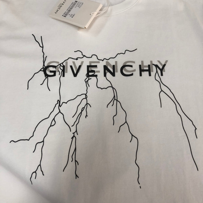 Flat lay presentation of Givenchy luxury clothing with tailored silhouette