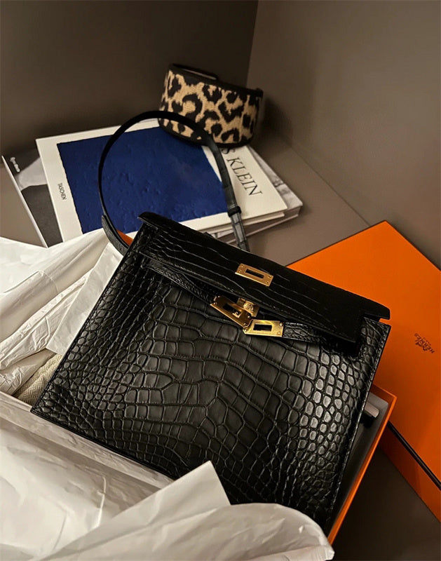 Side view of sculpted structured handbag