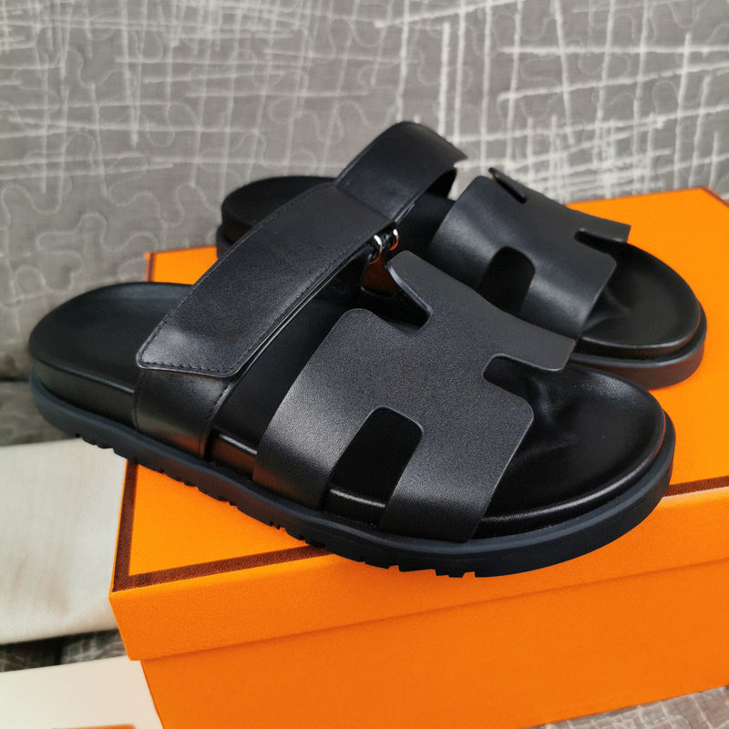 Hermes sandals Style 115 - close-up of classic monogram styling